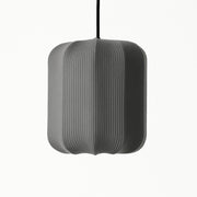 Gray pendant lamp with a ribbed texture on a white background