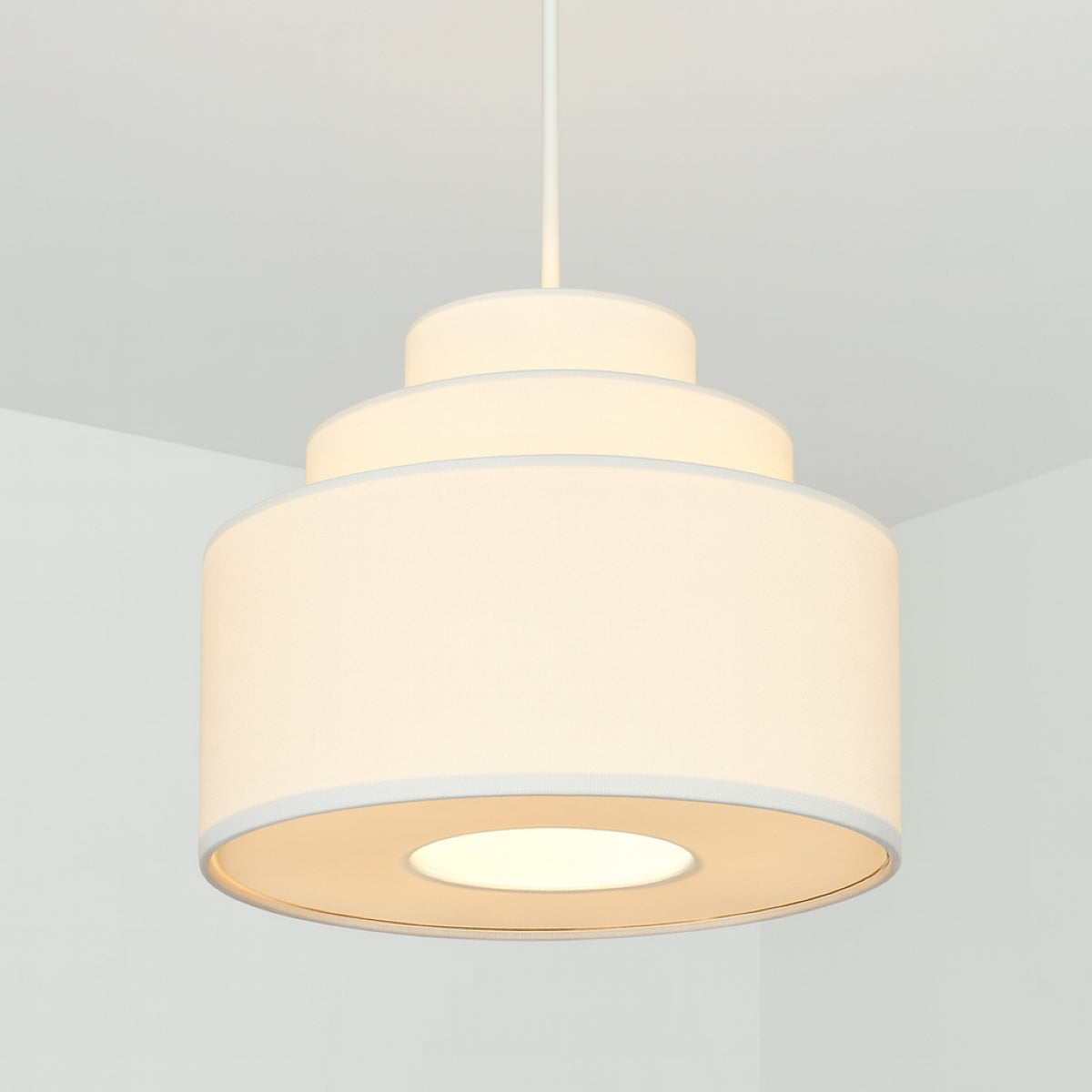 Beige pendant light on a gray background