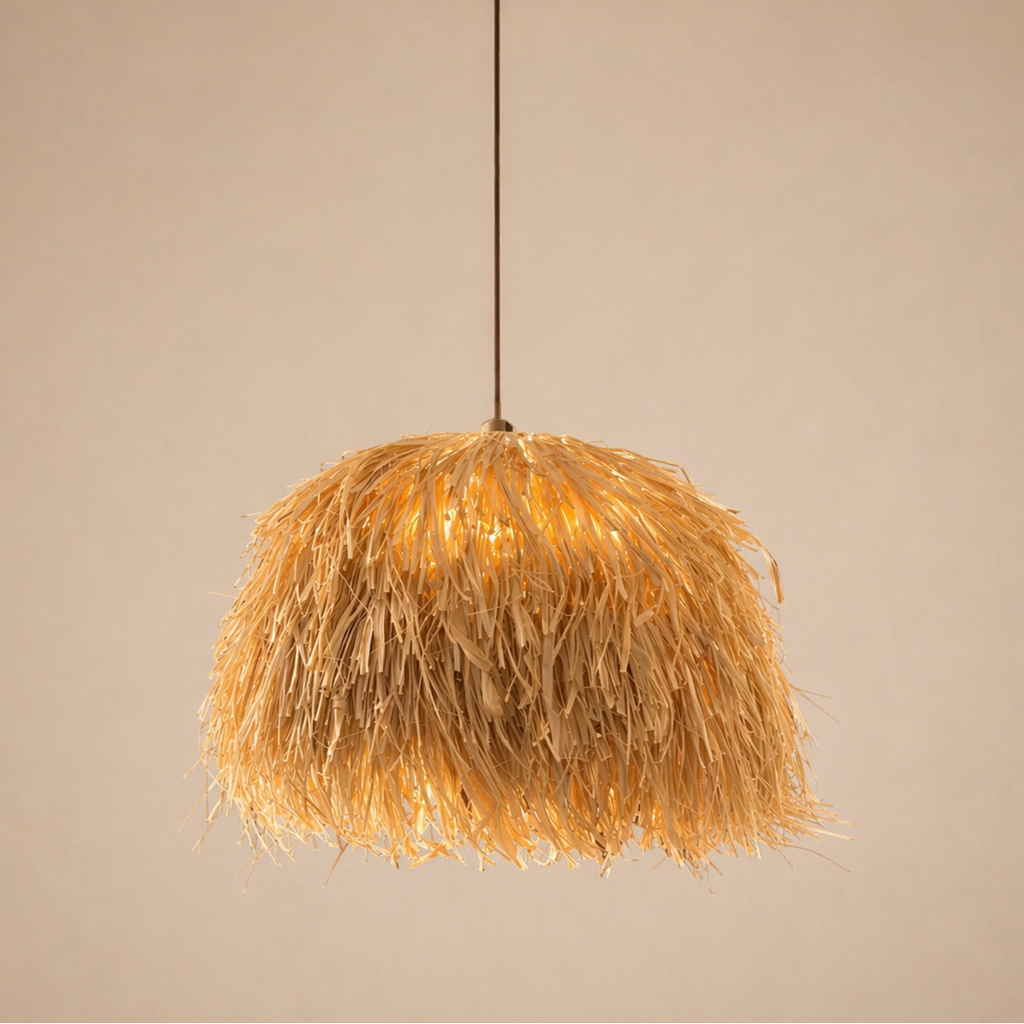 Decorative pendant light with a feather-like design on a beige background