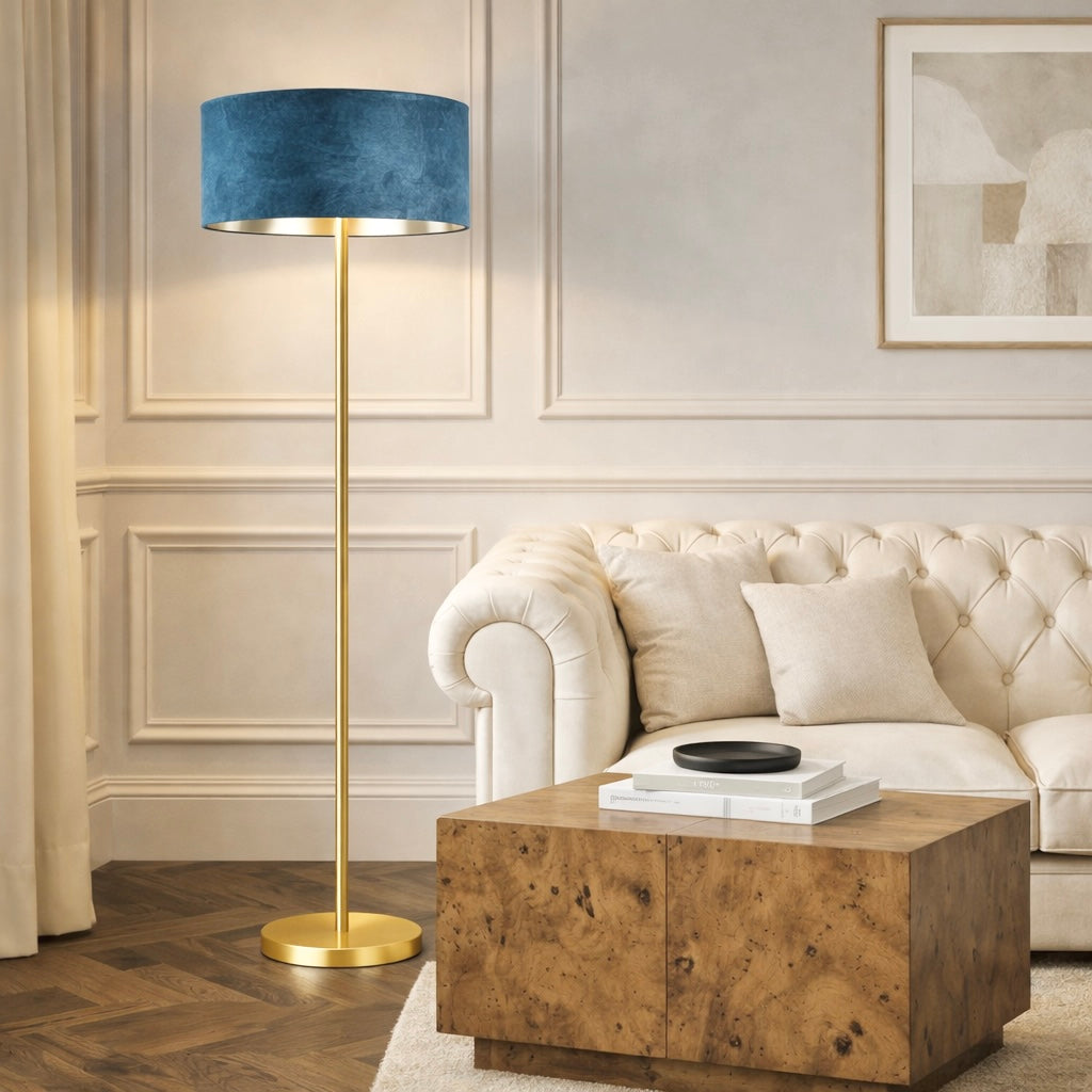 Living room with a blue lamp, beige sofa, and wooden coffee table.