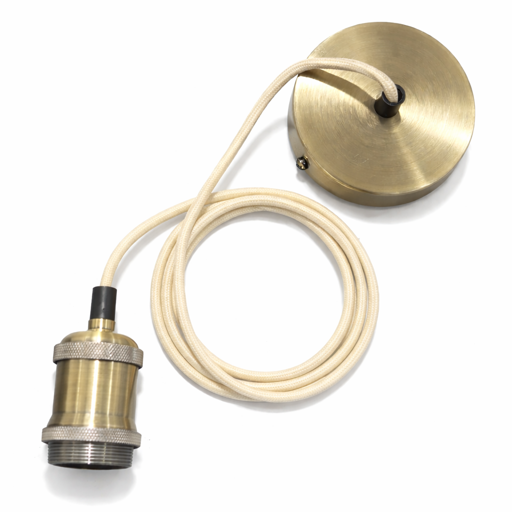 Brass lamp components on a white background