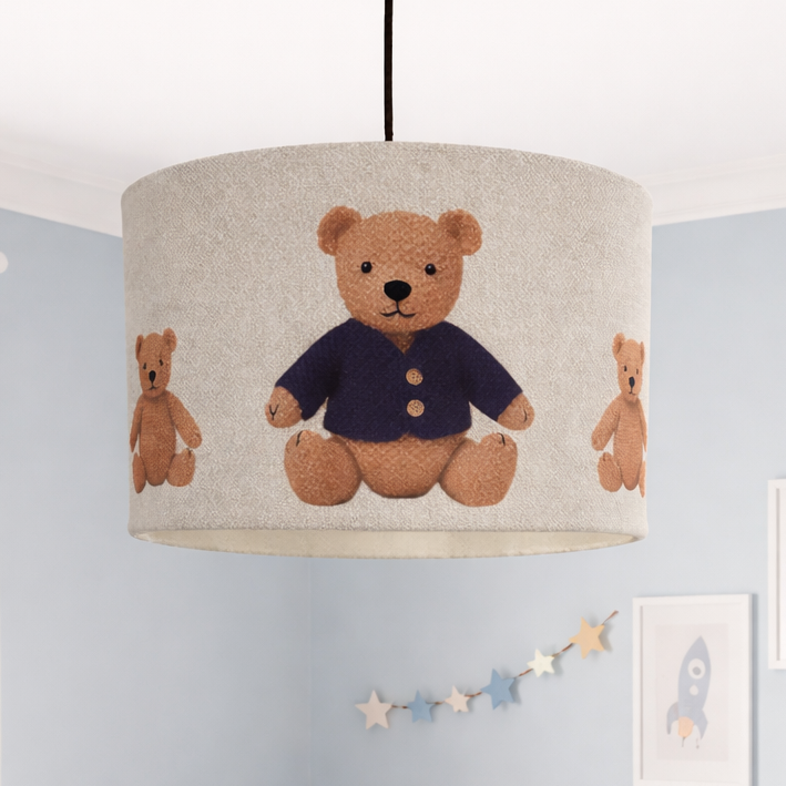 Children's bedroom with teddy bear theme, light blue walls, and white furniture.