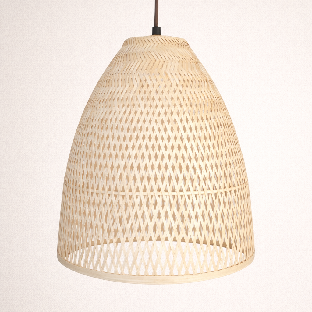 Woven rattan pendant light on a plain background
