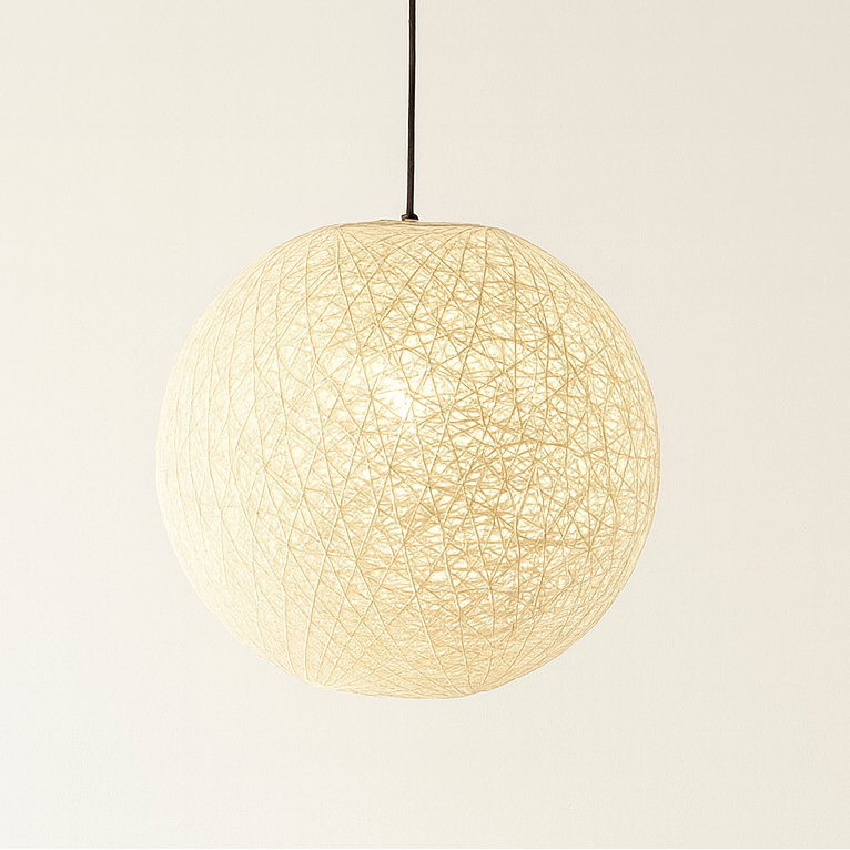 Pendant light with textured shade on a plain background