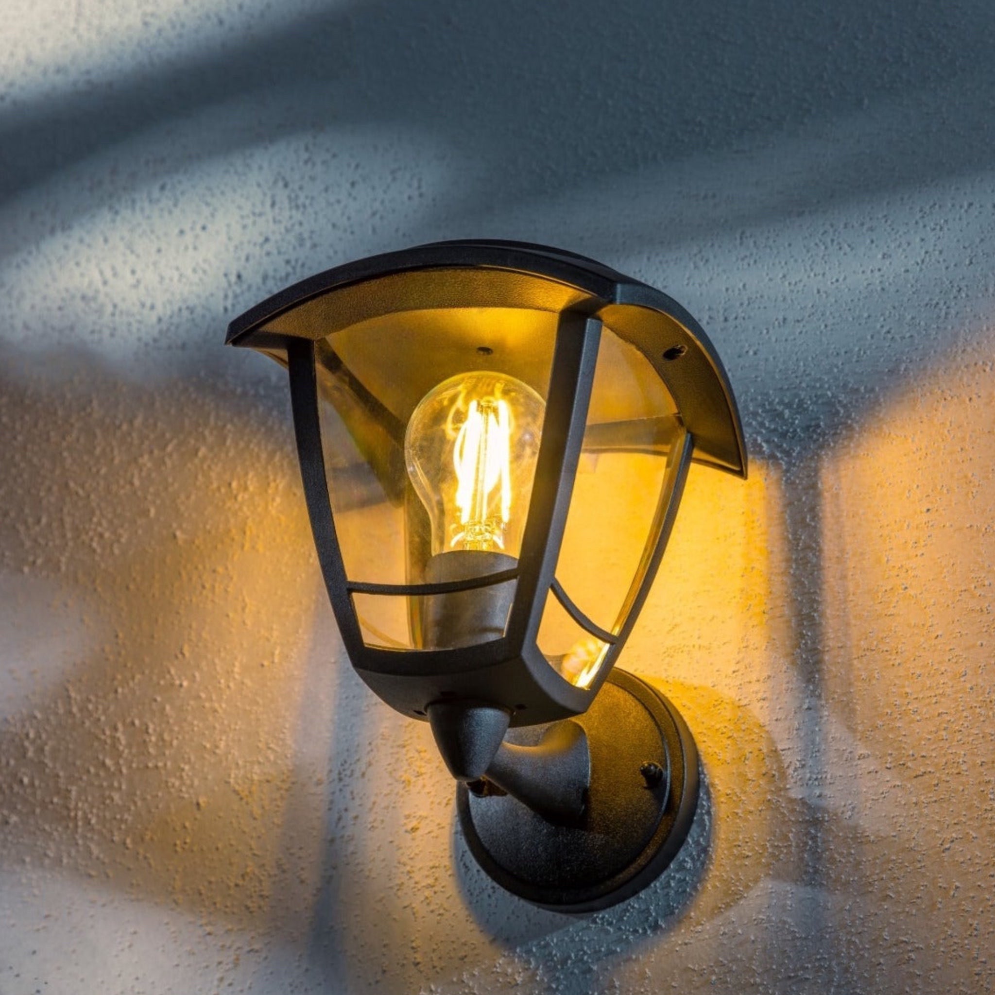 Create an aesthetically pleasing lighting system around your home with our Lara solar lantern light for your walls. This product is featured as an elegant and traditional lantern wall light design, constructed from black polycarbonate and fitted with clear polycarbonate diffusers.
