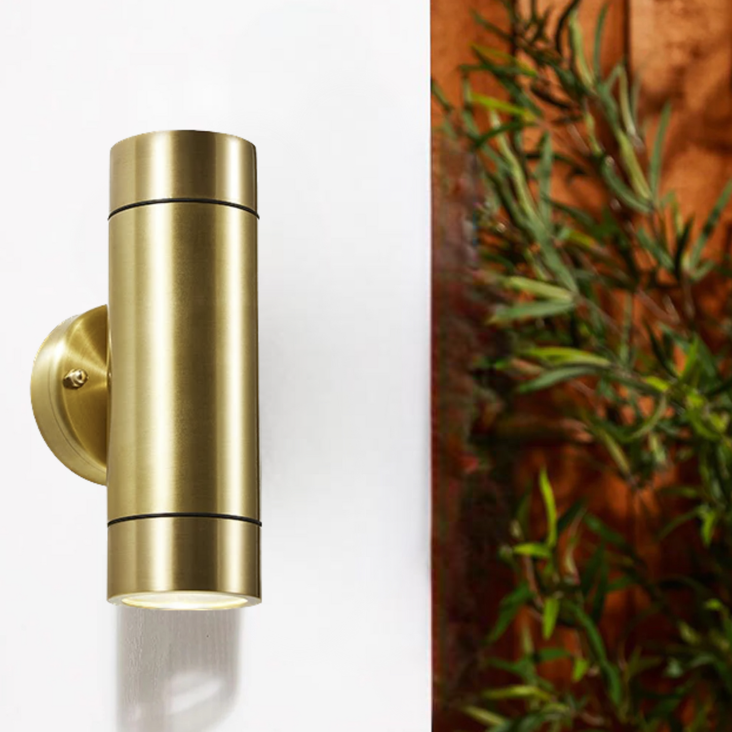Our Lucas brass double up and  down outdoor wall mounted single cylinder outdoor light would look perfect in a modern or more traditional home design. Outside wall lights can provide atmospheric light in your garden, at the front door or on the terrace as well as a great security solution. It is designed for durability and longevity with its robust material producing a fully weatherproof and water-resistant light fitting. Use LED bulbs to make this light energy efficient and low cost to run.