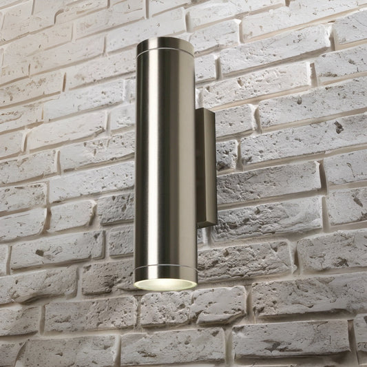 Our Lucas stainless steel extra long outdoor wall mounted up and down cylinder outdoor light would look perfect in a modern or more traditional home design. Outside wall lights can provide atmospheric light in your garden, at the front door or on the terrace as well as a great security solution. It is designed for durability and longevity with its robust material producing a fully weatherproof and water resistant light fitting.