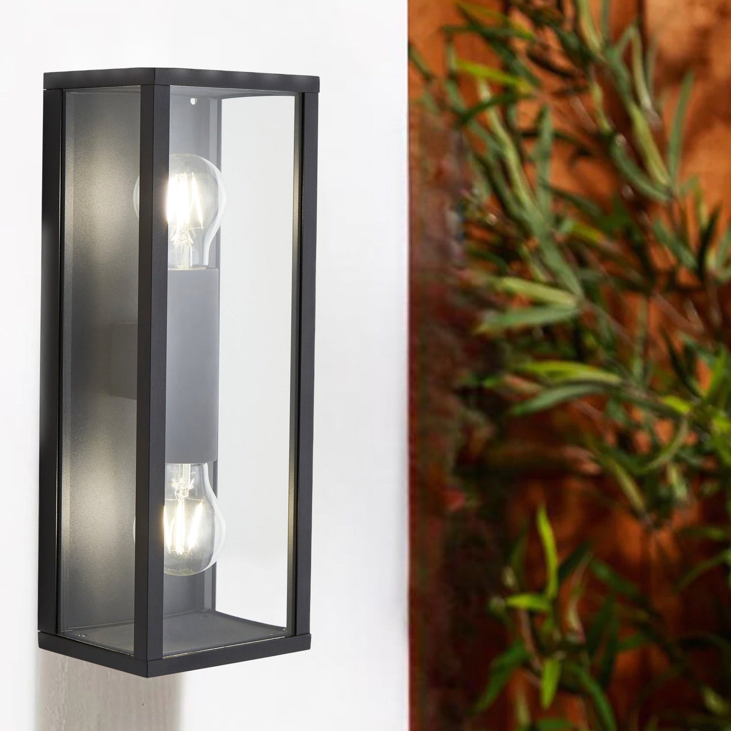 A modern take on a traditional design outdoor wall light perfect for adding style and security The traditional front-door lantern has had a modern make over in the form of our Seb double up and down wall light with its square glass windows a striking die cast matt black finish this is sure to add an statement to any wall. 