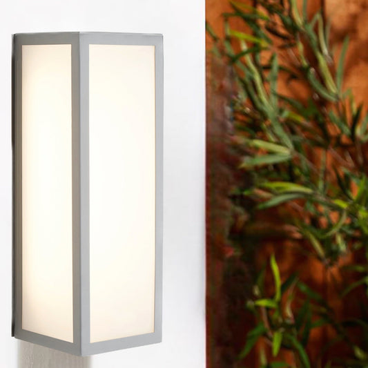 A modern take on a traditional design outdoor wall light perfect for adding style and security The traditional front-door lantern has had a modern make over in the form of our Harri  outdoor wall light with its square silver stainless steel construction and completed with opal polycarbonate windows this light this is sure to add an statement to any wall. 