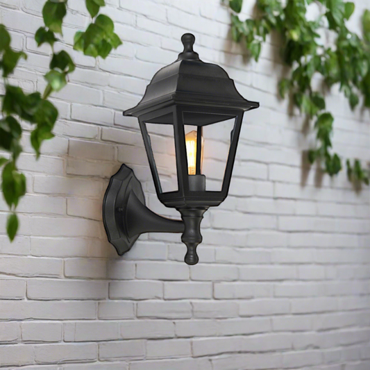 Our Dahlia lantern delivers on style and durability and is a smart choice for your exterior lighting. With its black polycarbonate construction teamed with clear polycarbonate panes this lantern is hardwearing and rust and weatherproof