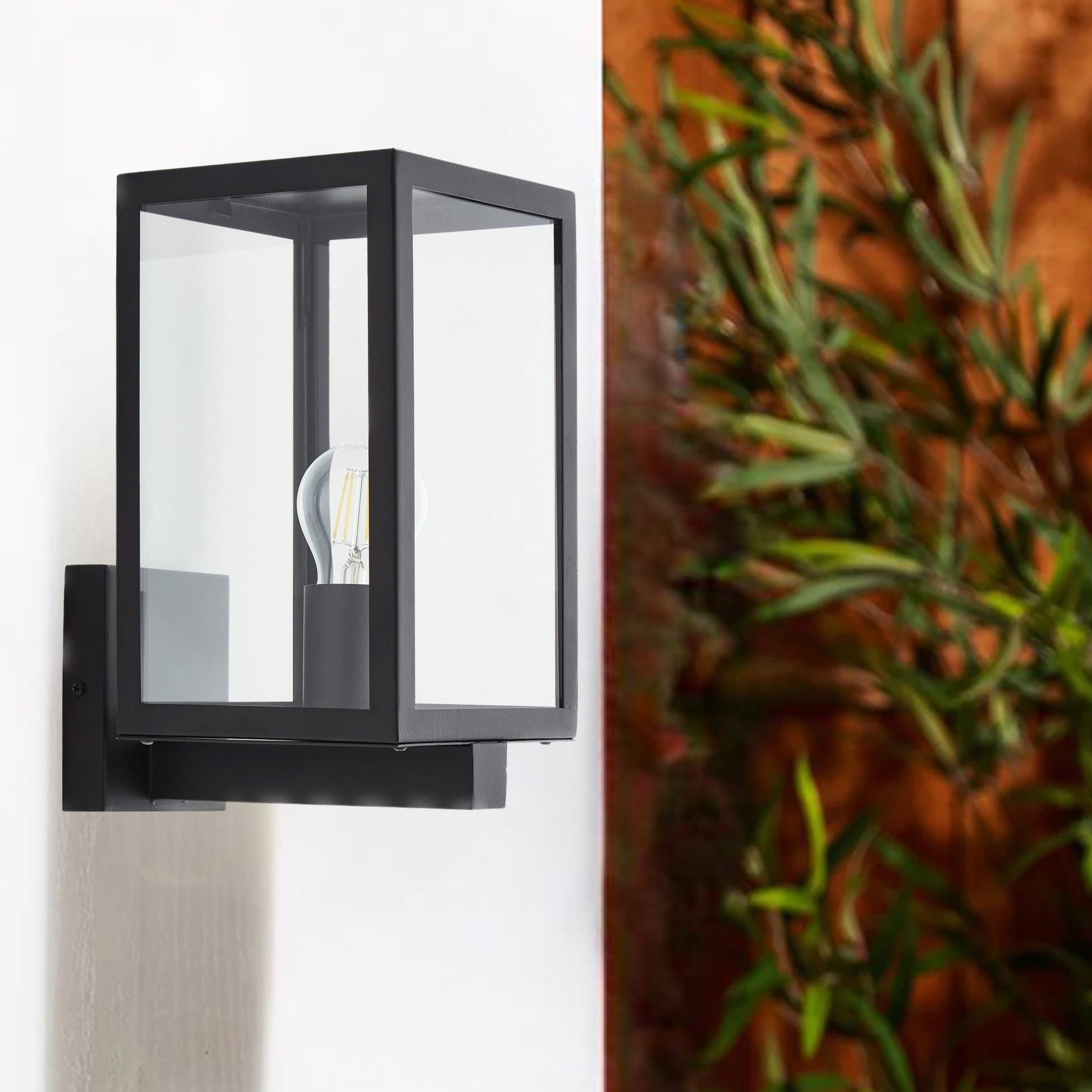 A modern take on a traditional design outdoor wall light perfect for adding style and security The traditional front-door lantern has had a modern make over in the form of our Archie outdoor wall light with its square black stainless steel construction and completed with clear glass windows this light this is sure to add an statement to any wall. 