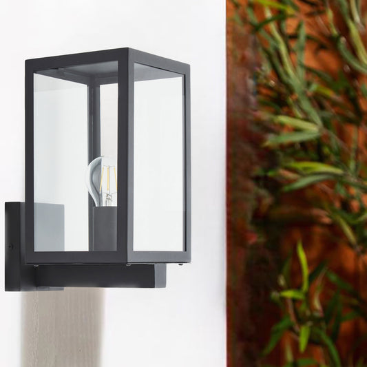 A modern take on a traditional design outdoor wall light perfect for adding style and security The traditional front-door lantern has had a modern make over in the form of our Archie  outdoor wall light with its square stainless steel construction with a grey anthracite finish and completed with clear glass windows this light this is sure to add an statement to any wall. 