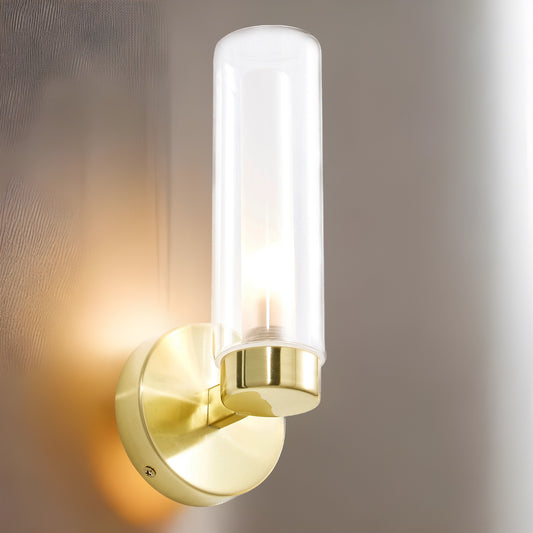 Our Nada satin brass wall light with clear glass diffuser adds a touch of opulence and luxury to the walls of your home. The modern light fitting would look perfect fitted next to a mirror, on corridors or hallways, bedside and living rooms, and as a bonus to this light the IP44 protection makes it suitable for all bathrooms.
