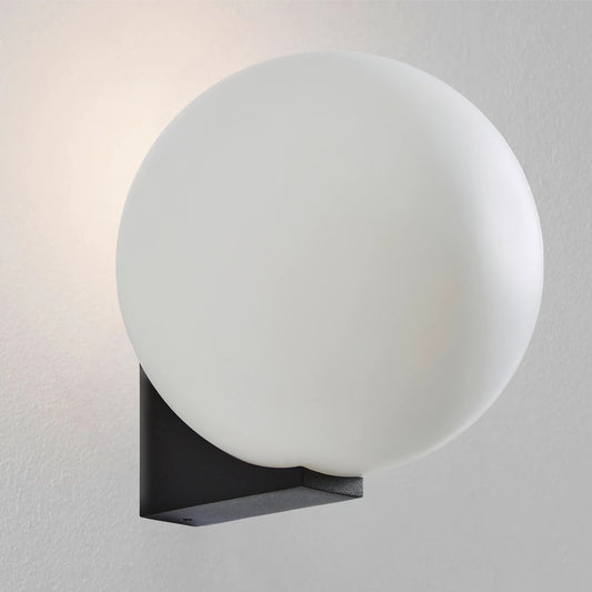 Our Jasper black wall light with white opal glass diffuser adds a touch of opulence and luxury to the walls of your home. The modern light fitting would look perfect installed next to a mirror, on corridors or hallways, bedside and living rooms, this light also has IP44 protection making it suitable for all bathrooms. 