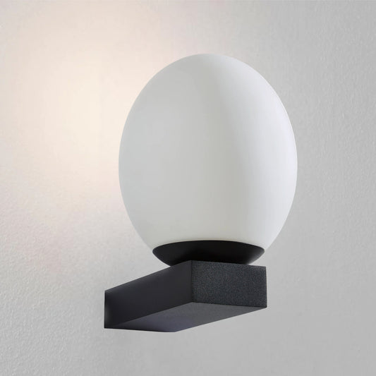 Our Louis black wall light with white opal glass diffuser adds a touch of opulence and luxury to the walls of your home. The modern light fitting would look perfect installed next to a mirror, on corridors or hallways, bedside and living rooms, this light also has IP44 protection making it suitable for all bathrooms. 