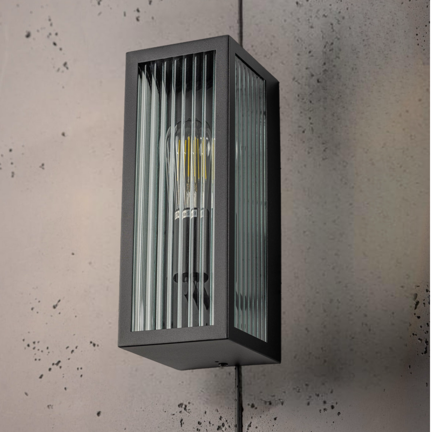 If you’re looking for a modern take on a traditional outdoor wall light, this modern bevelled glass rectangle wall light is perfect for adding style and protection for your home. This classic wall light is designed with a contemporary twist, styled with a rectangle shape and fitted with glass bevelled windows that allow the light to shine effectively.