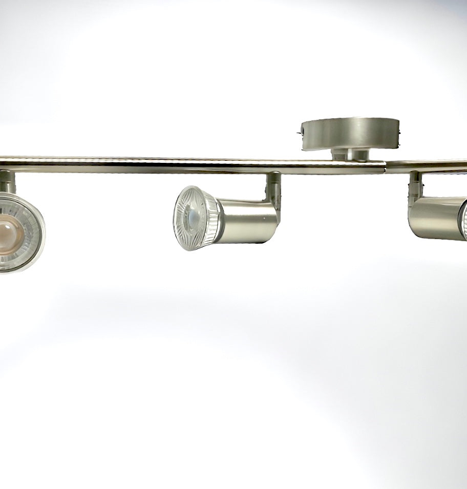 Our Kendal 4 Light Spotlight Bar is the perfect addition to your interior lighting arrangements, finished in satin silver it's perfect for adding a sleek lighting design to your room. The modern design features 2 adjustable arms which are fitted with 4 adjustable light heads and perfect for lighting your kitchen – ensuring all spaces are efficiently illuminated with a practical task light that can be adjusted to your needs.