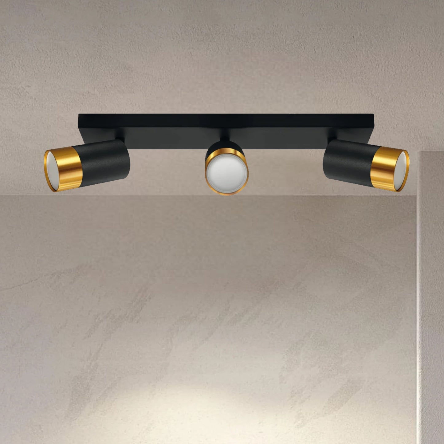 Puzon's elegant and stylish finish makes it the ideal accent to any room. It will look perfect in both traditional and modern environments. It has three adjustable heads so you can set the spot lights according to your preferences. For longevity and durability, the lamp is constructed of aluminium that has been powder coated black and finished with gold detailing. It has an IP20 level of protection, making it touch and dust resistant. Intended for internal use.