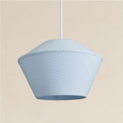 Light blue pendant lamp on a beige background
