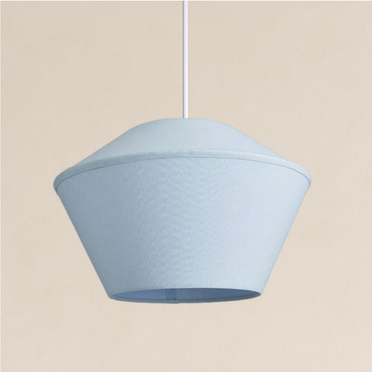 Light blue pendant lamp on a beige background