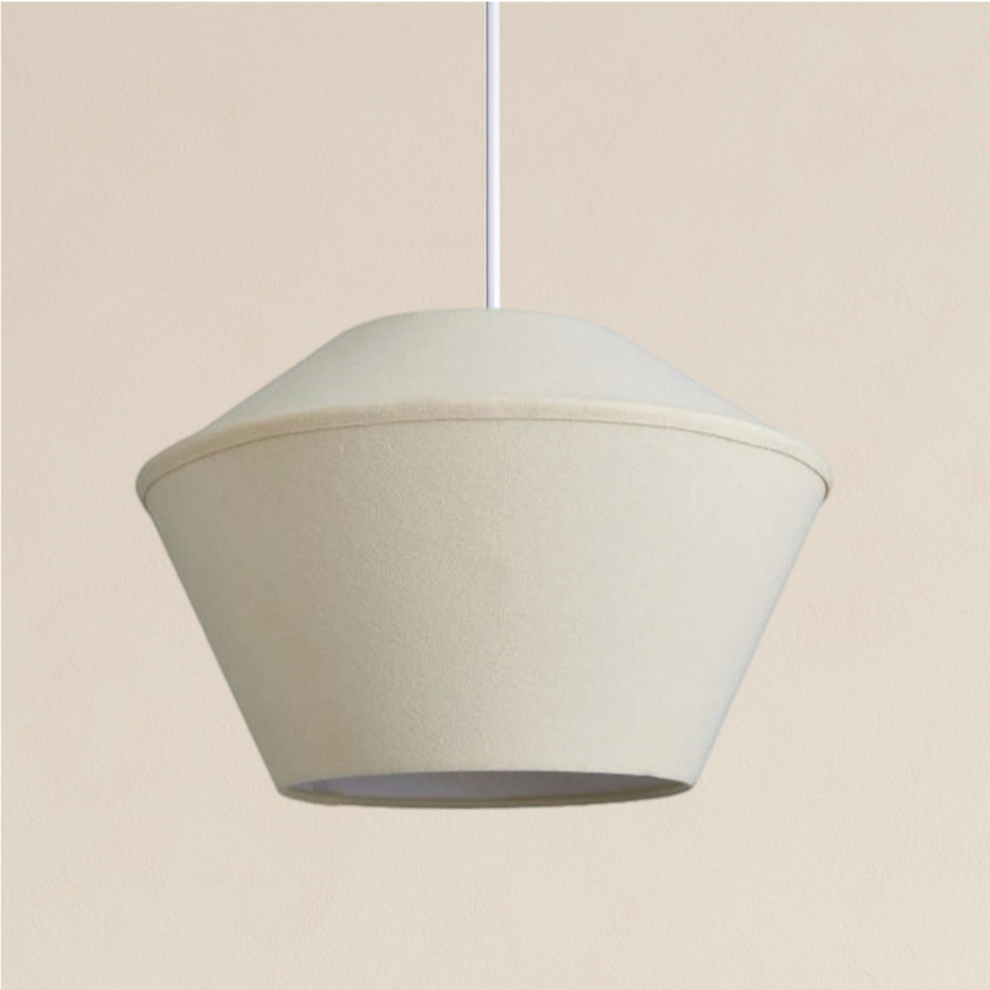 Beige pendant light on a beige background
