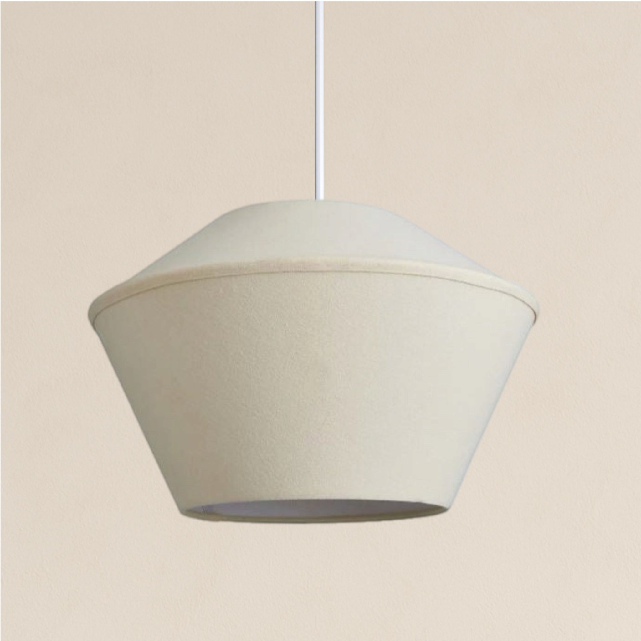 Beige pendant light on a beige background