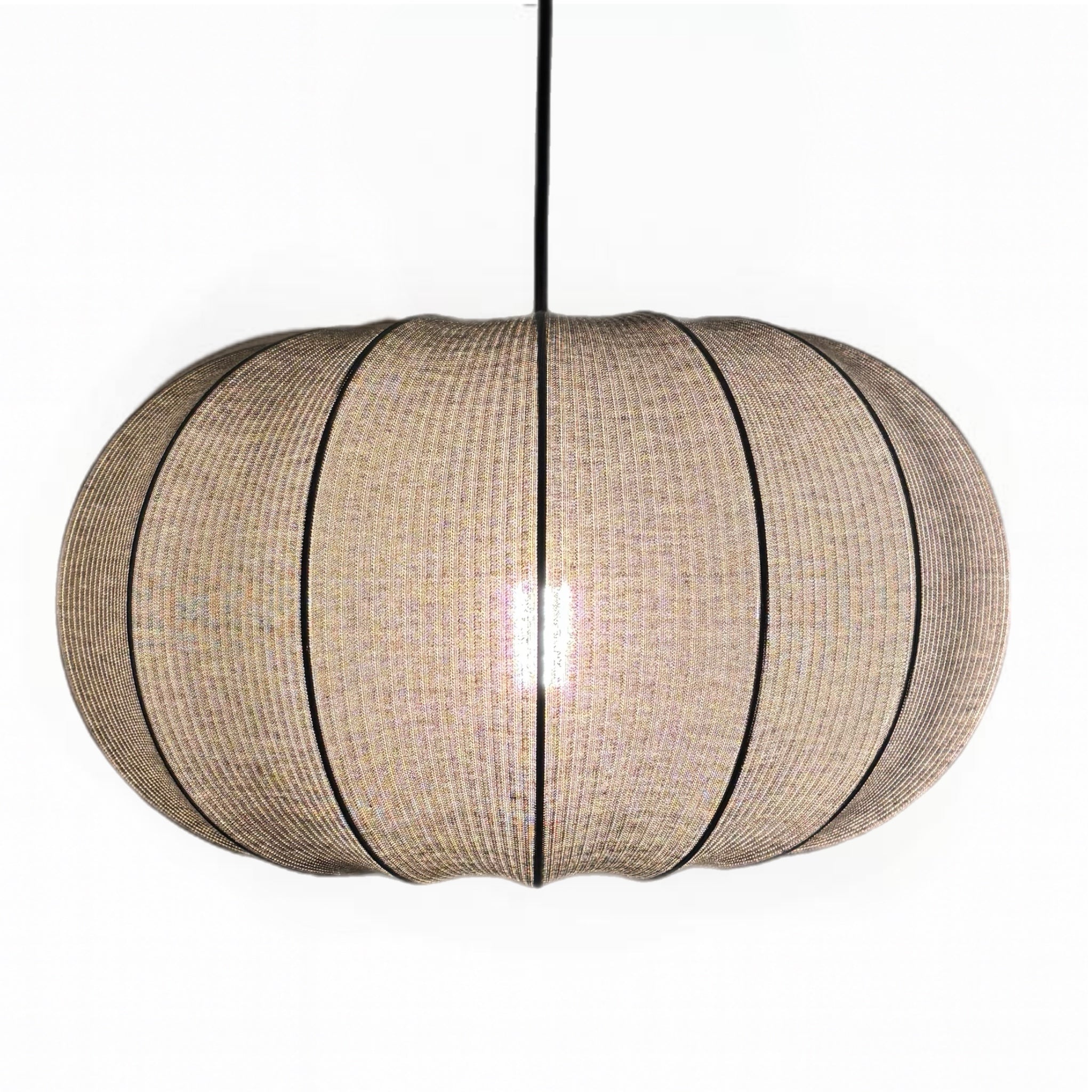 Woven pendant light on a white background