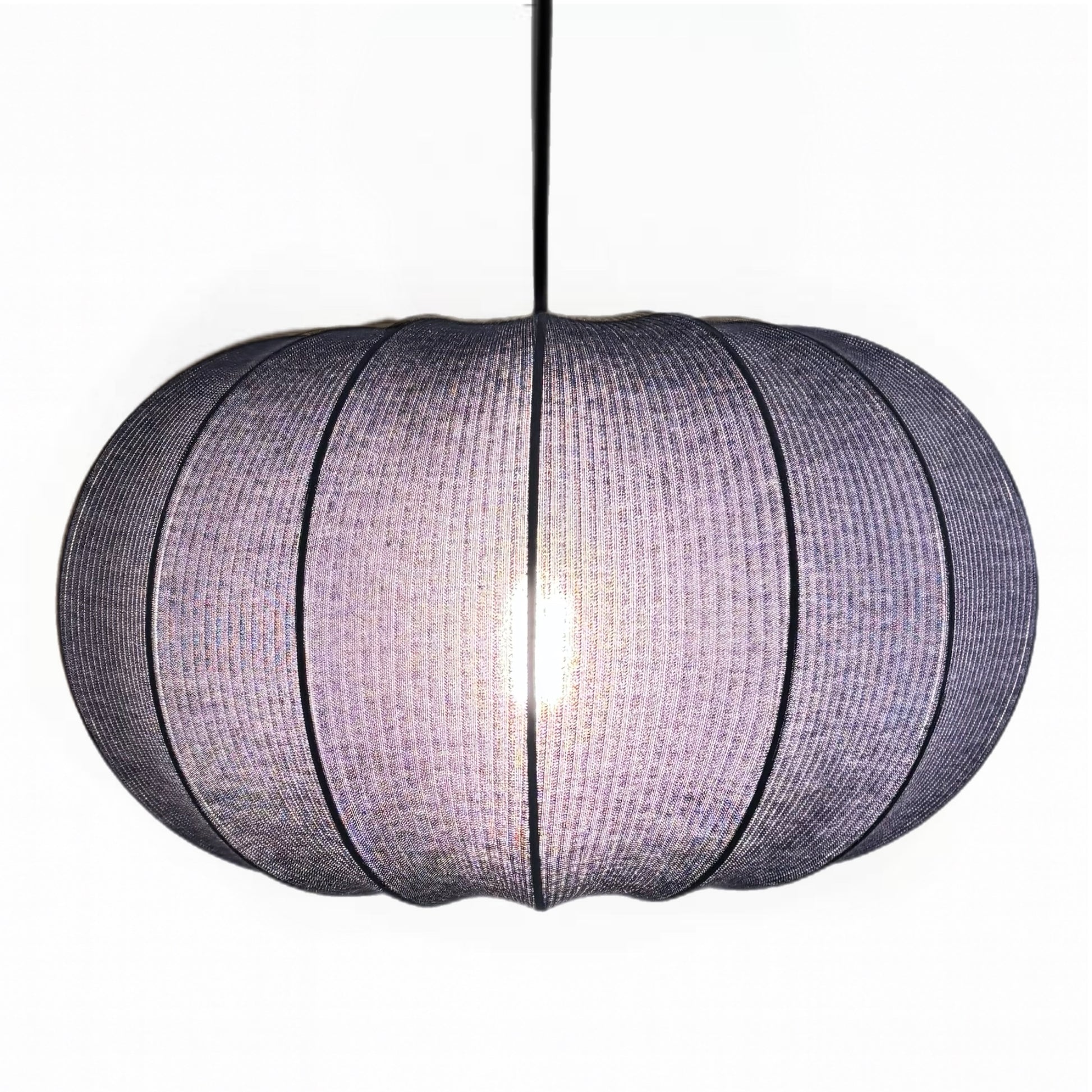 Round woven pendant light on a white background