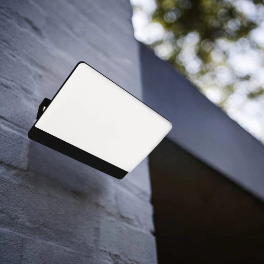 Our Parry LED outdoor wall light is a highly efficient light source.  This flood light is a stylish outdoor solution for your home. It has a solid aluminium construction and a polycarbonate cover. The easily adjustable design of this outdoor flood light allows it to be used functionally for lighting paths and aesthetically decorate the walls of your home with a beautiful, bright glow. It is resistant to weather conditions and has an IP65 rating.
