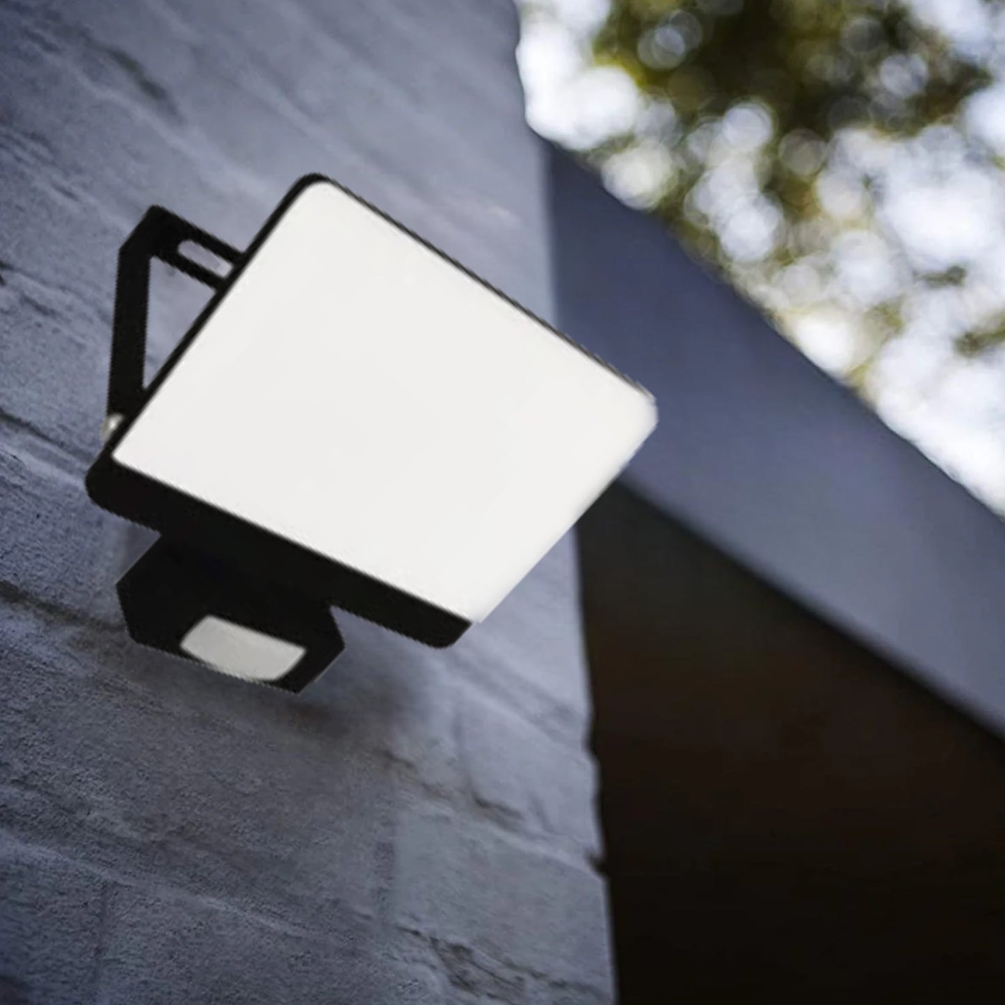 Our Parry LED outdoor wall light with built in PIR motion sensor is a highly efficient light source.  This flood light is a stylish outdoor solution for your home. It has a solid aluminium construction and a polycarbonate cover. The easily adjustable design of this outdoor flood light allows it to be used functionally for lighting paths and aesthetically decorate the walls of your home with a beautiful, bright glow