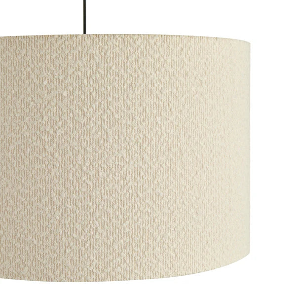 Textured beige lampshade on a white background