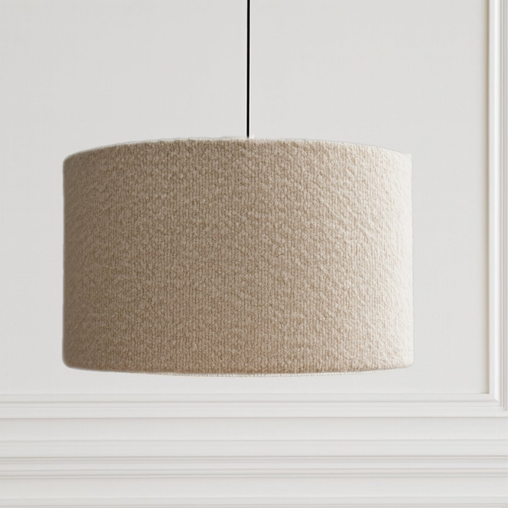 Beige textured lampshade on a white background