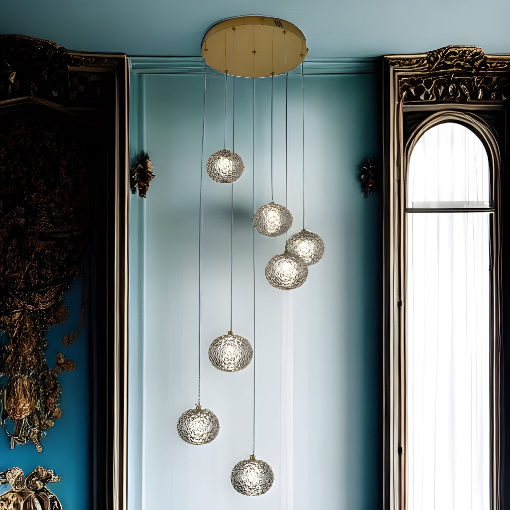 Our striking 6 Ball LED pendant light in gold with height adjustable smoked acrylic globes is the perfect way to make a statement with your interiors. It is inspired by elements of the night sky, comprising of a delicately crafted smoked acrylic crystal globes in round spherical shape and perfectly finished in low energy built in LED lights.