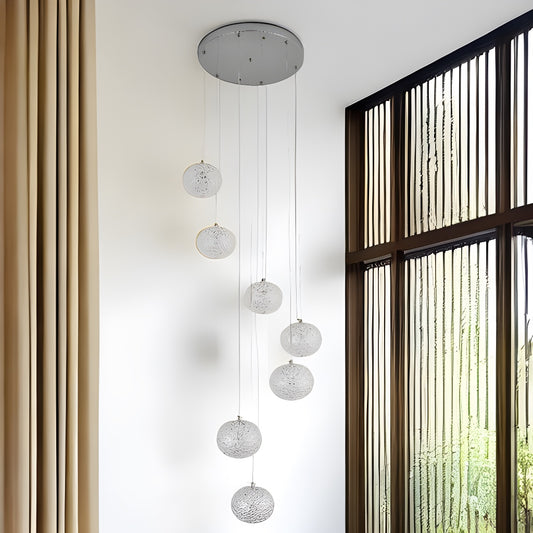 Our striking 7 Ball LED pendant light in chrome with height adjustable clear acrylic globes is the perfect way to make a statement with your interiors. It is inspired by elements of the night sky, comprising of a delicately crafted clear acrylic crystal globes in round spherical shape and perfectly finished in low energy built in LED lights.