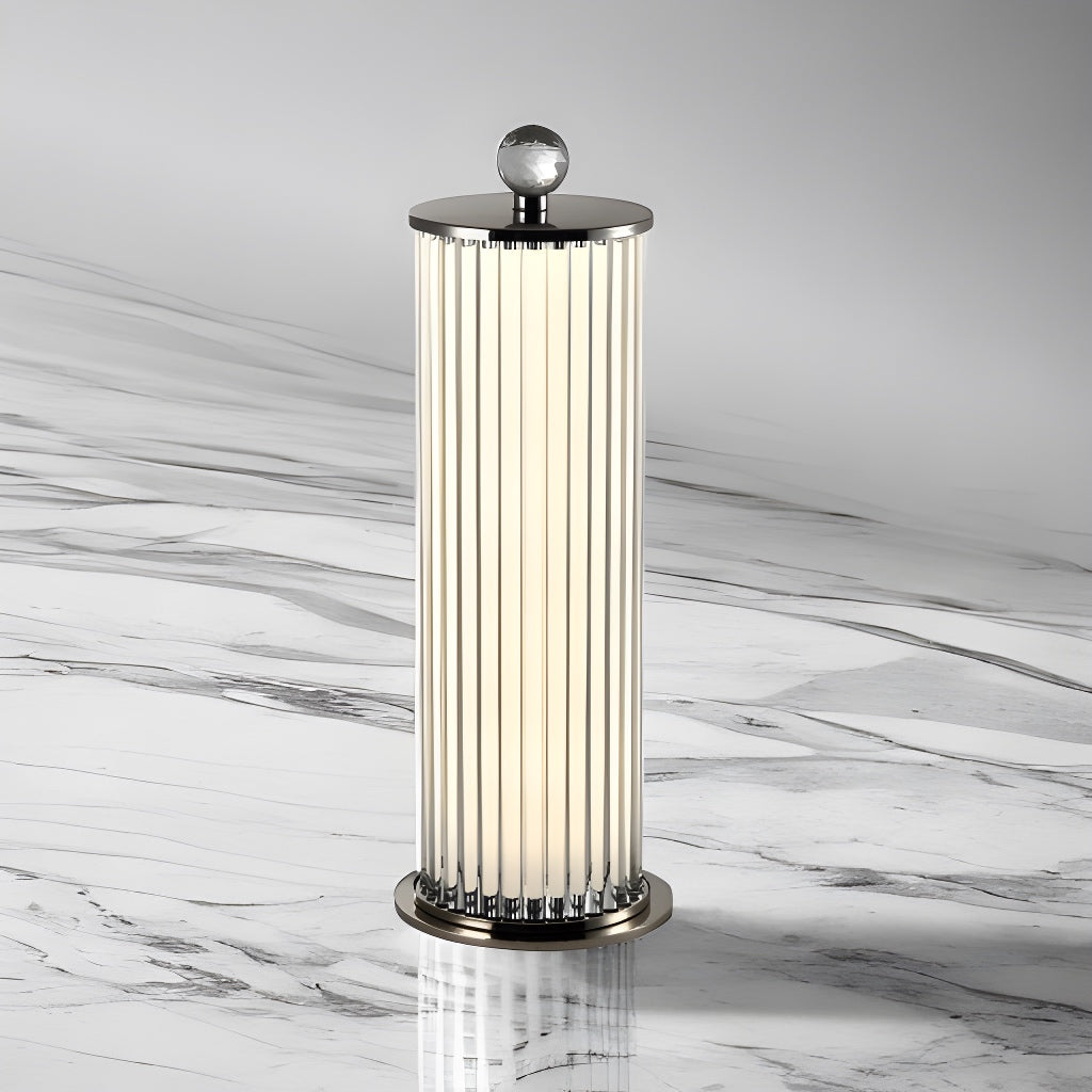 Introducing our Celia table lamp with its elegant crystal and chrome finish it will be sure to make a stylish addition to any living space. It features a contemporary crystal rod construction encasing an opal white light and is complimented by a chrome base and top and finished with a glass crystal for that undeniably luxurious style.