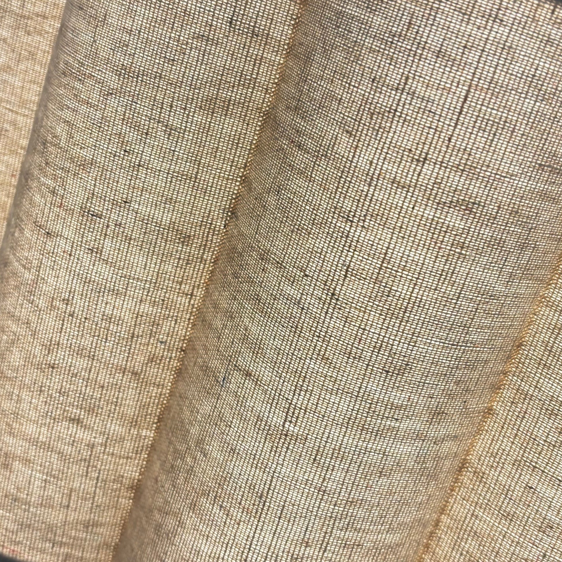 Close-up of textured lampshades with a blurred background