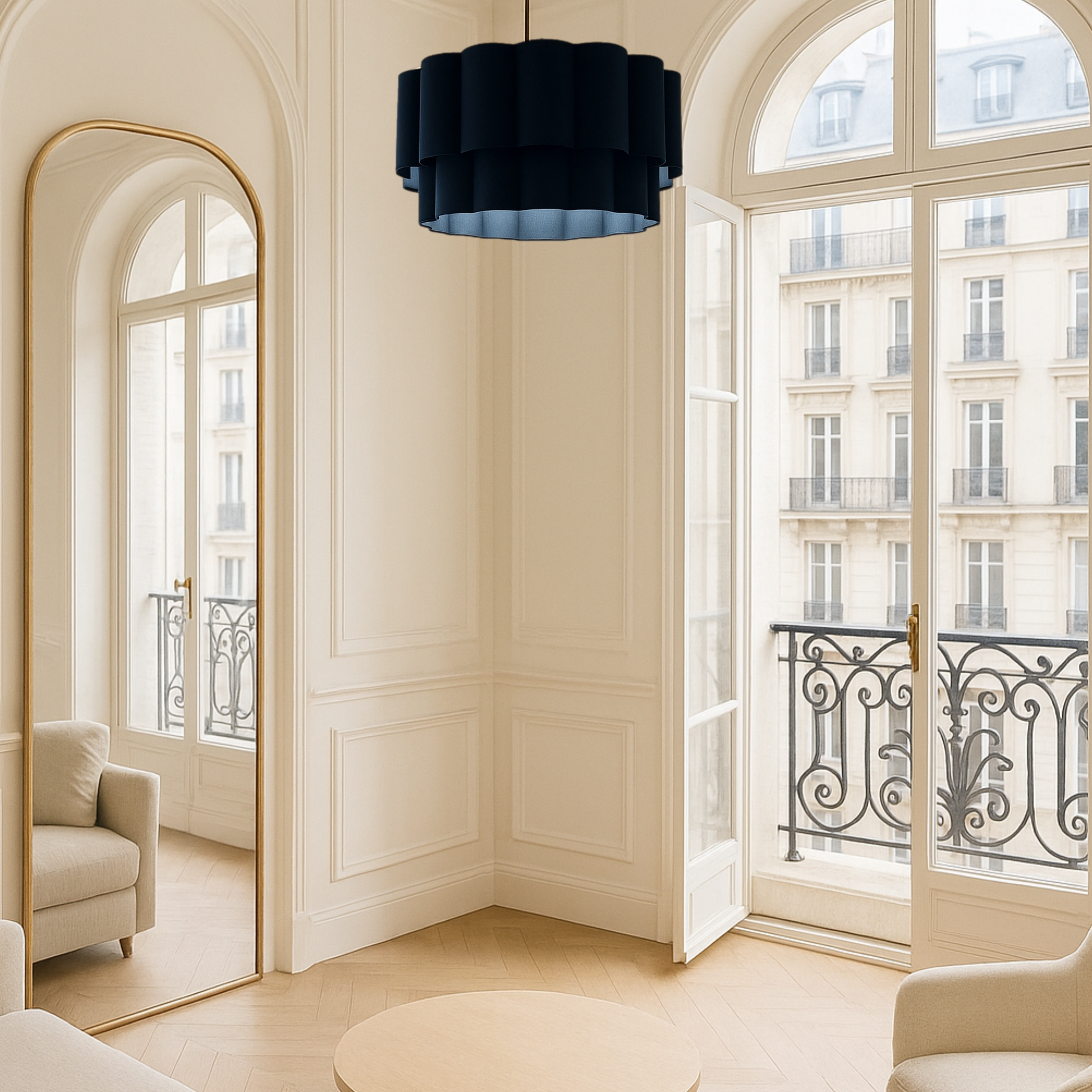 Luxurious interior with a navy blue chandelier, large windows, and cream walls.