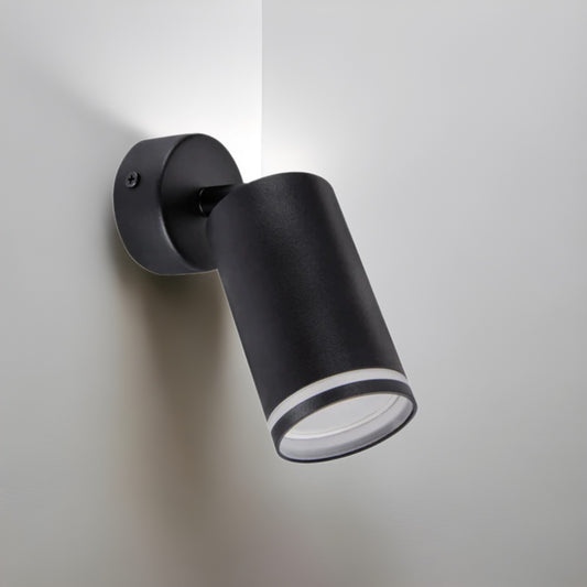 The black LED Oli spot light consists of a cylindrical spotlight, which can be tilted and adjusted on its own axis. The spotlight is attached to a circular base, which makes it equally suitable for mounting on walls and ceilings. Made of an aluminum body and powder coated black, this ceiling spot light design fits well into different spaces. Whether functional office or cozy home - the timeless lamp is an perfect for many types of use.