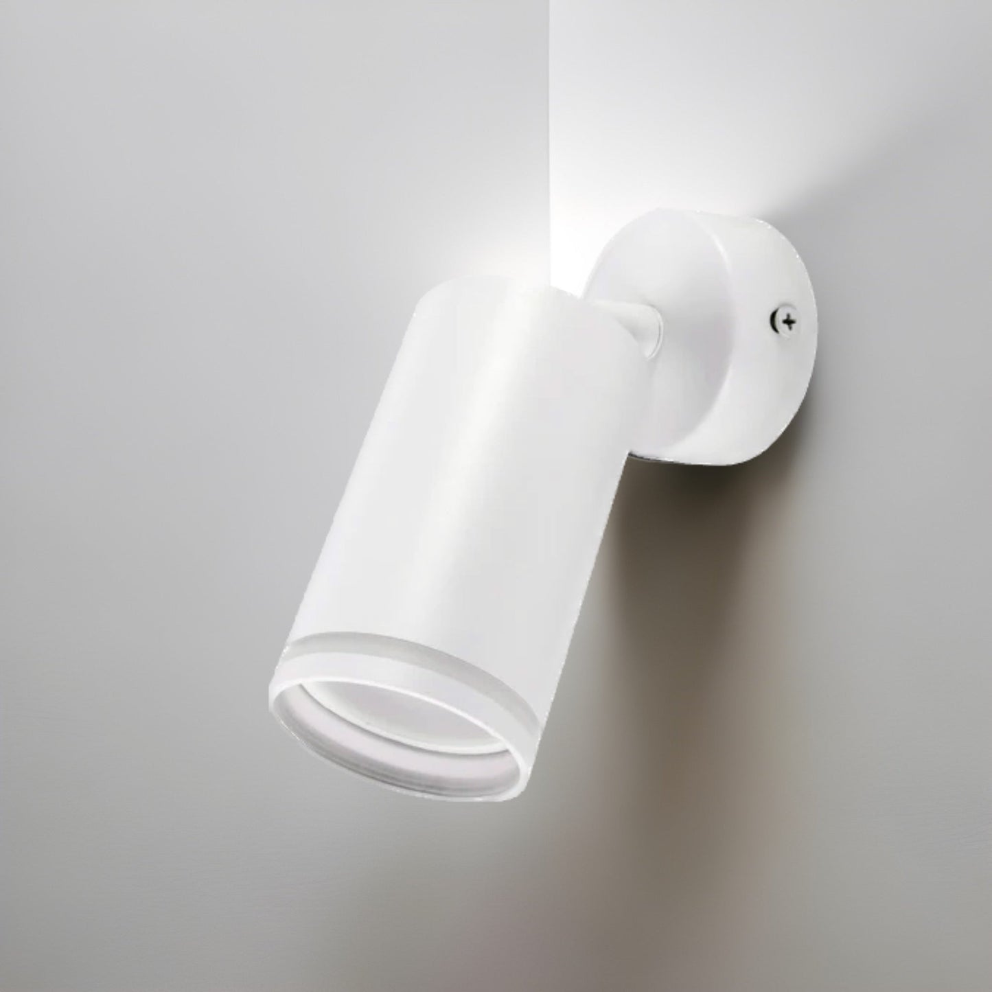 The white LED Oli spot light consists of a cylindrical spotlight, which can be tilted and adjusted on its own axis. The spotlight is attached to a circular base, which makes it equally suitable for mounting on walls and ceilings. Made of an aluminum body and powder coated white, this ceiling spot light design fits well into different spaces. Whether functional office or cozy home - the timeless lamp is an perfect for many types of use.