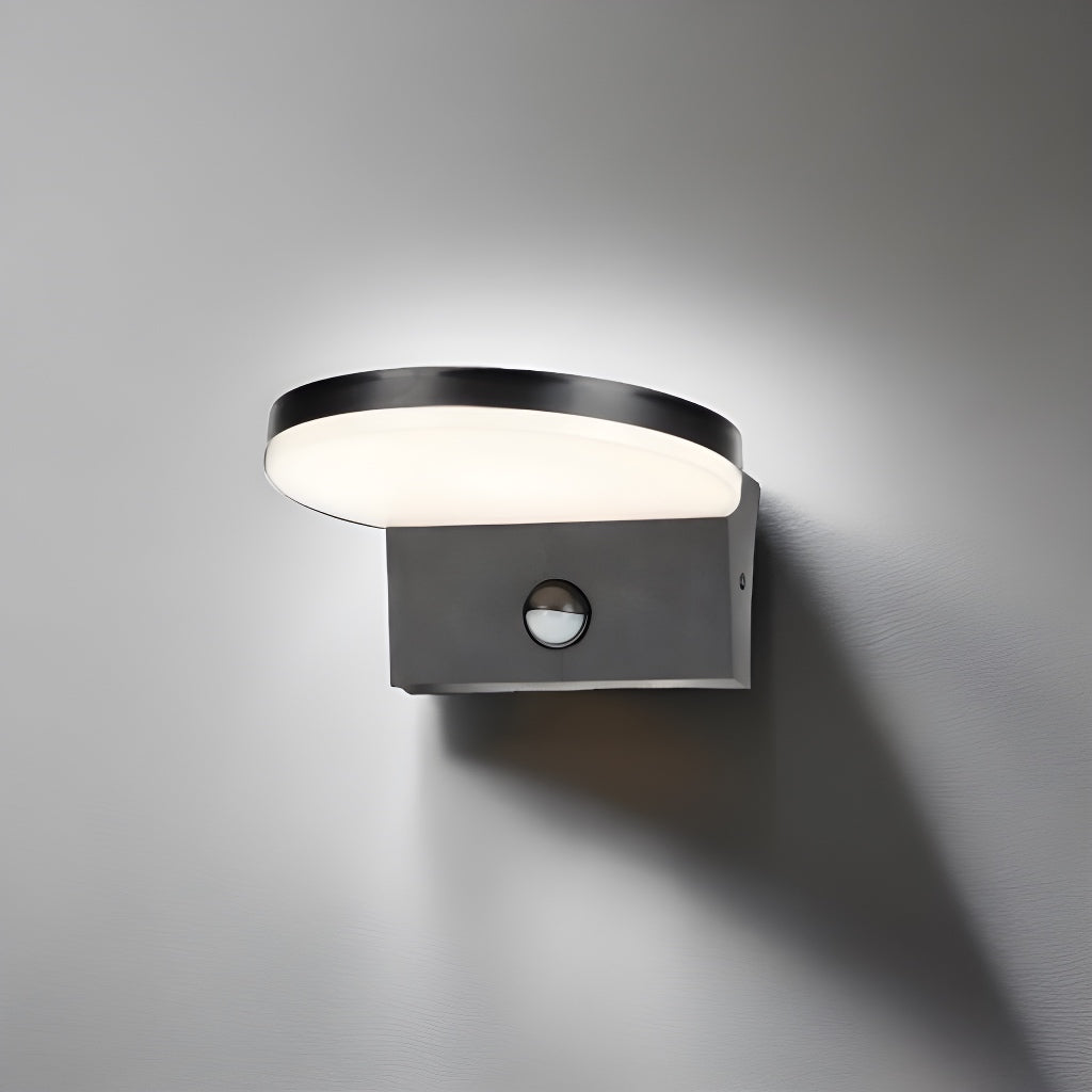 Our Aubrey black plastic ABS plastic outdoor wall mounted round outdoor light with built in LED's and motion sensor would look perfect in a modern or more traditional home design. Outside wall lights can provide atmospheric light in your garden, at the front door or on the terrace as well as a great security solution. It is designed for durability and longevity with its robust material producing a fully weatherproof and water resistant light fitting.