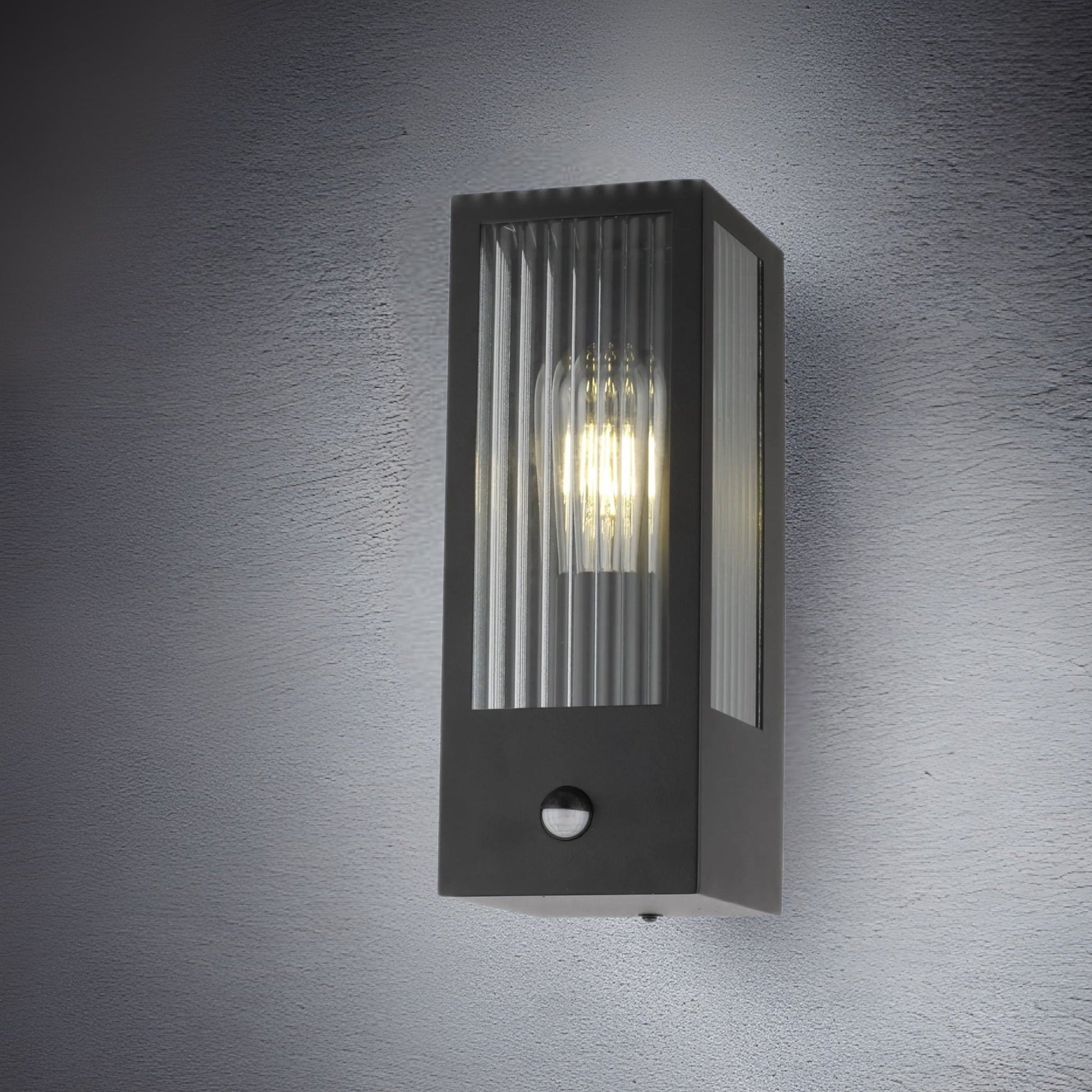 If you’re looking for a modern take on a traditional outdoor wall light, this modern bevelled glass rectangle wall light is perfect for adding style and protection for your home. This classic wall light is designed with a contemporary twist, styled with a rectangle shape and fitted with glass bevelled windows that allow the light to shine effectively. Integrated PIR Motion Sensor.