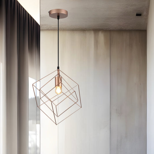 Our ROSA pendant light is a stylish addition suitable for every room, its metal rose gold square cage shape with matching gold smaller square inner creates an amazing feature on any ceiling. The lamp looks great with a filament light bulb, especially in industrial and modern interiors.