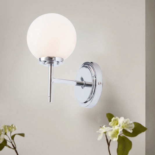 Our Marley globe armed wall light is a stylish light fitting ideal for the modern home and can be used in the bathroom. It features a chrome round ceiling plate and a globe opal glass shade mounted on a chrome arm.