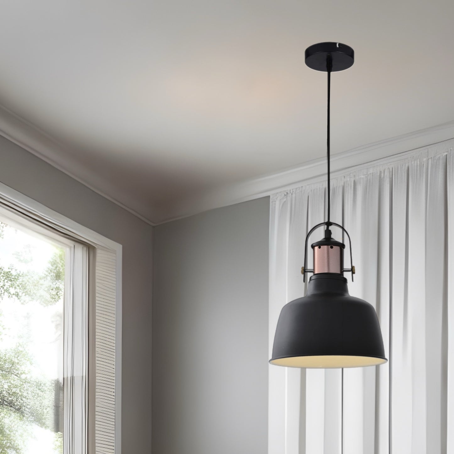 Our Marnie black adjustable dome ceiling pendant light is the perfect addition to any room to add a modern and industrial focal point. The industrial style of this light brings a dark and elegant aesthetic to your interior as the dome shape creates a modern and contemporary appearance. Would look great above a kitchen island or dining table. The height can be adjusted at the time of fitting.