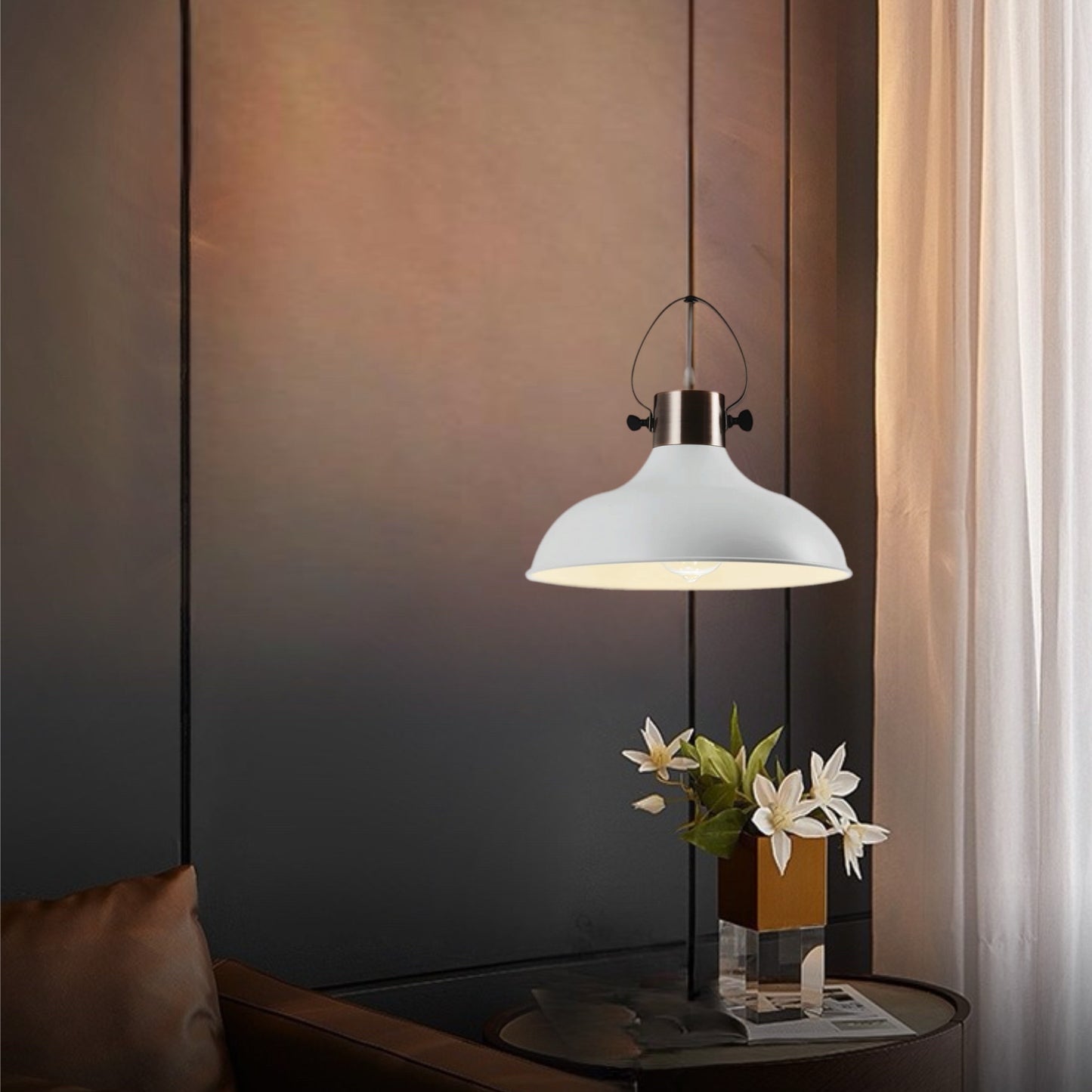 Our popular Wanda ceiling light, comes in a signature dome shape with contrasting top. It is height-adjustable at the point of installation so you can position it to your exact requirements. One E27 bulb is required and as it enhances such a warm and inviting glow, would look great above kitchen islands, dining tables or as main light fitting in any room