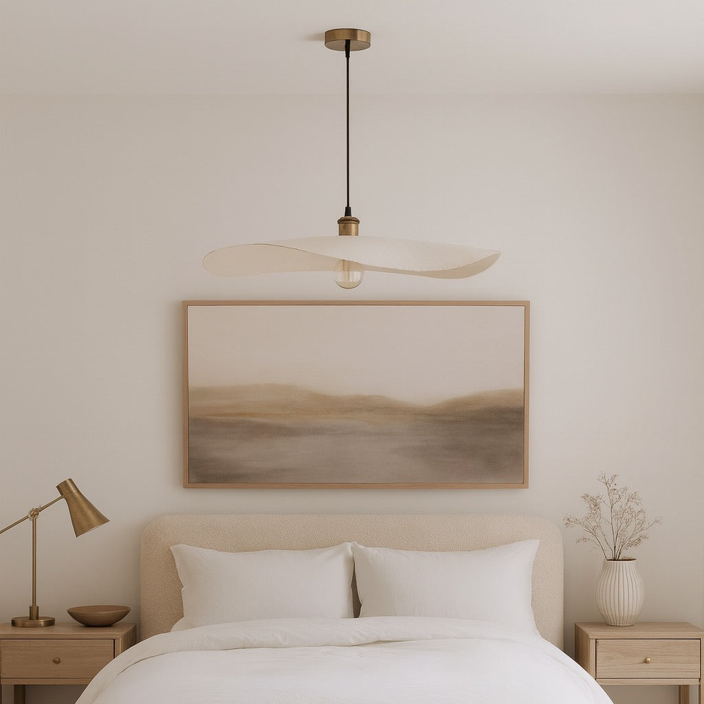 Modern bedroom with abstract painting, ceiling light, and bedside lamps.