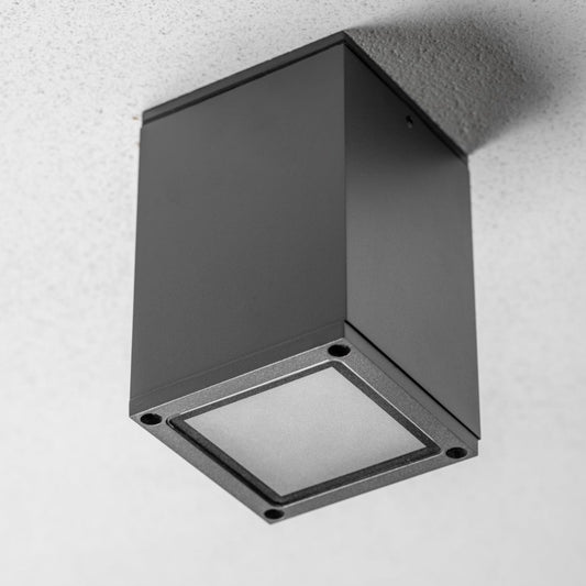 Our Len ceiling outdoor porch light delivers on style and durability and is a smart choice for your exterior lighting. With its dark grey powder coated aluminium construction teamed with clear polycarbonate diffuser, this lantern is hardwearing and rust and weatherproof. Built for life outdoors, it has an IP54 rating which means it can withstand the harshest of weather conditions. For sophisticated yet robust outdoor lighting, our Len dark grey outdoor ceiling spot light is a strong contender.