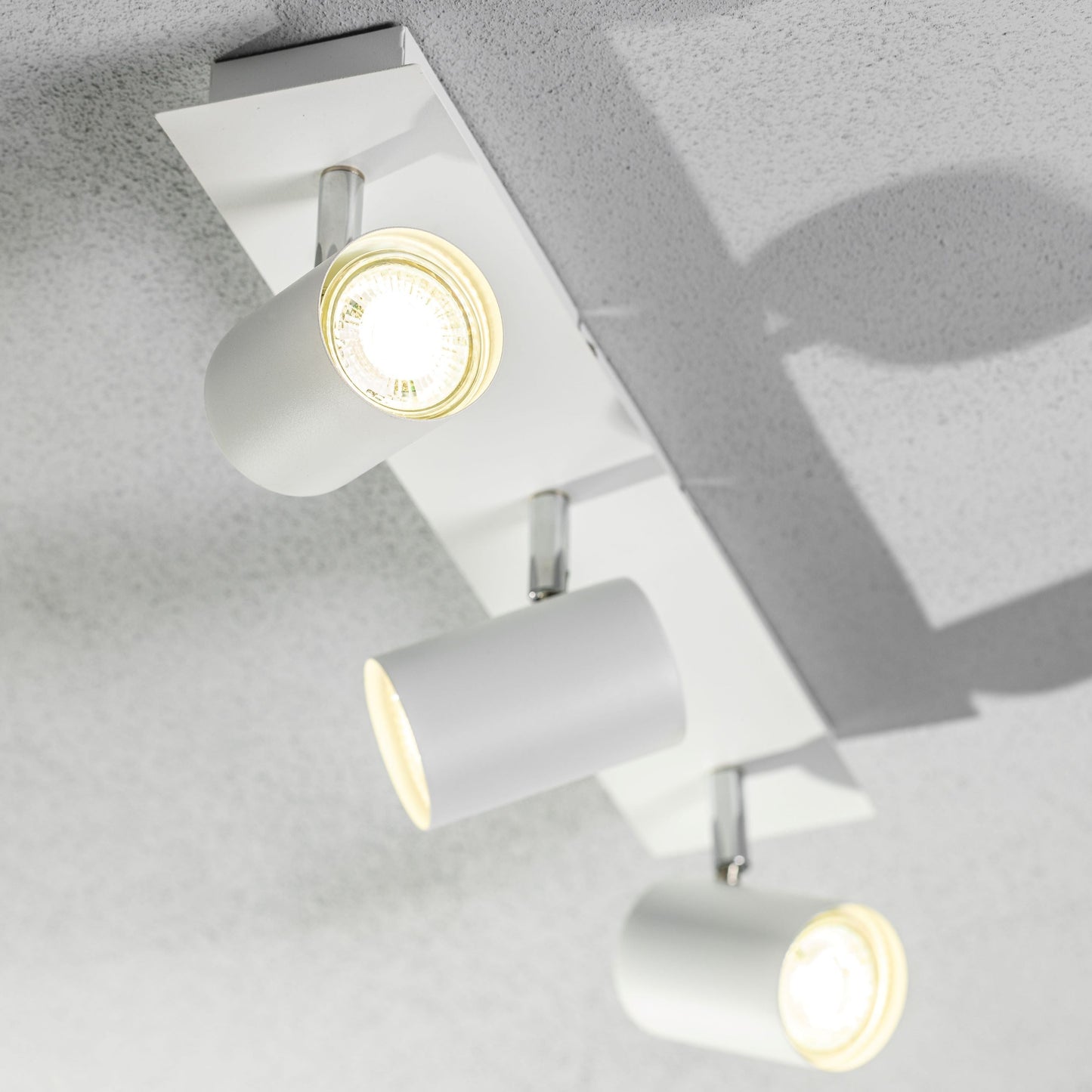 Add an industrial style to your home with the VENETO  spotlight light finished in white. The lamp is also ideal for task lighting due to the adjustable heads providing a focused beam. The simplistic design of this light fitting makes it suitable for all interior styles.