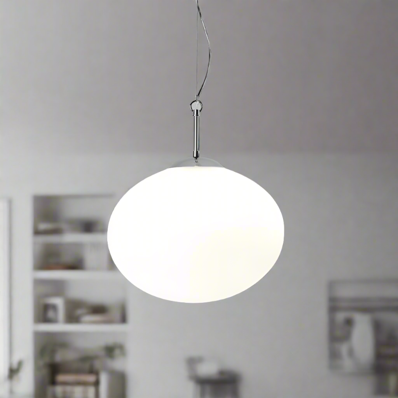 Add a touch of modern elegance to your home with our Frazer adjustable pendant light. The light has been handblown to create something spectacular, this opal glass light fitting with a chrome fittings is ideal for the modern home. Dimmable light fitting compatible with a dimmable bulb. 