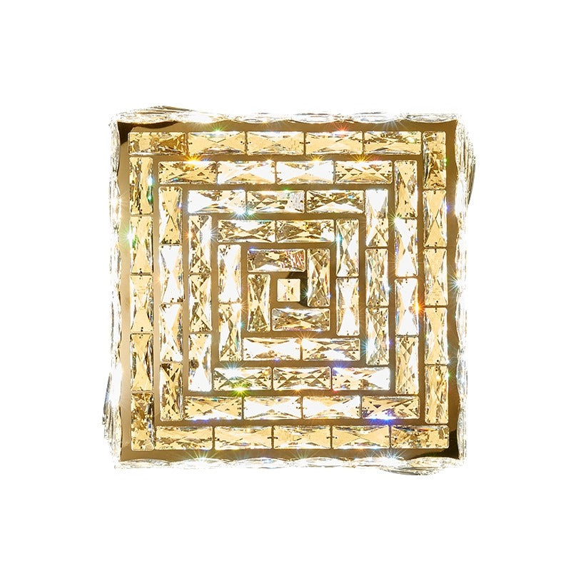 Introducing our Harmony ceiling light with its elegant crystal and golden finish it will be sure to make a stylish addition to any living space. It features an ornate cut glass crystal design encasing the entire light fitting and is complimented by a gold back plate that gives the light an undeniably luxurious style. Ceiling lamps don't come much more opulent than the Harmony ceiling light.